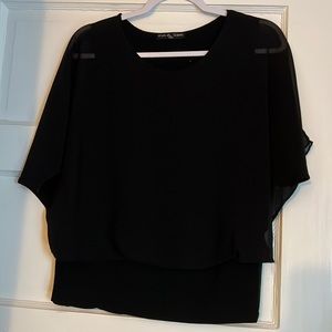 Black blouse with sheer overlay